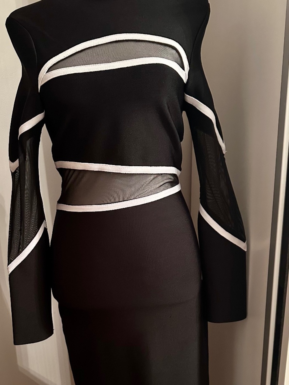 Karen Millen black dress with white stripes on sleeves and waistband, size XS. B